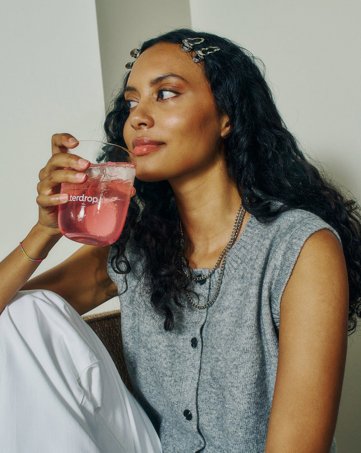 Woman holding waterdrop® Advent Calendar Small glass.