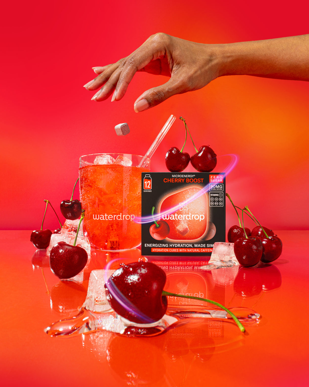 Cherry Boost hydration cube dropped into iced cherry drink.