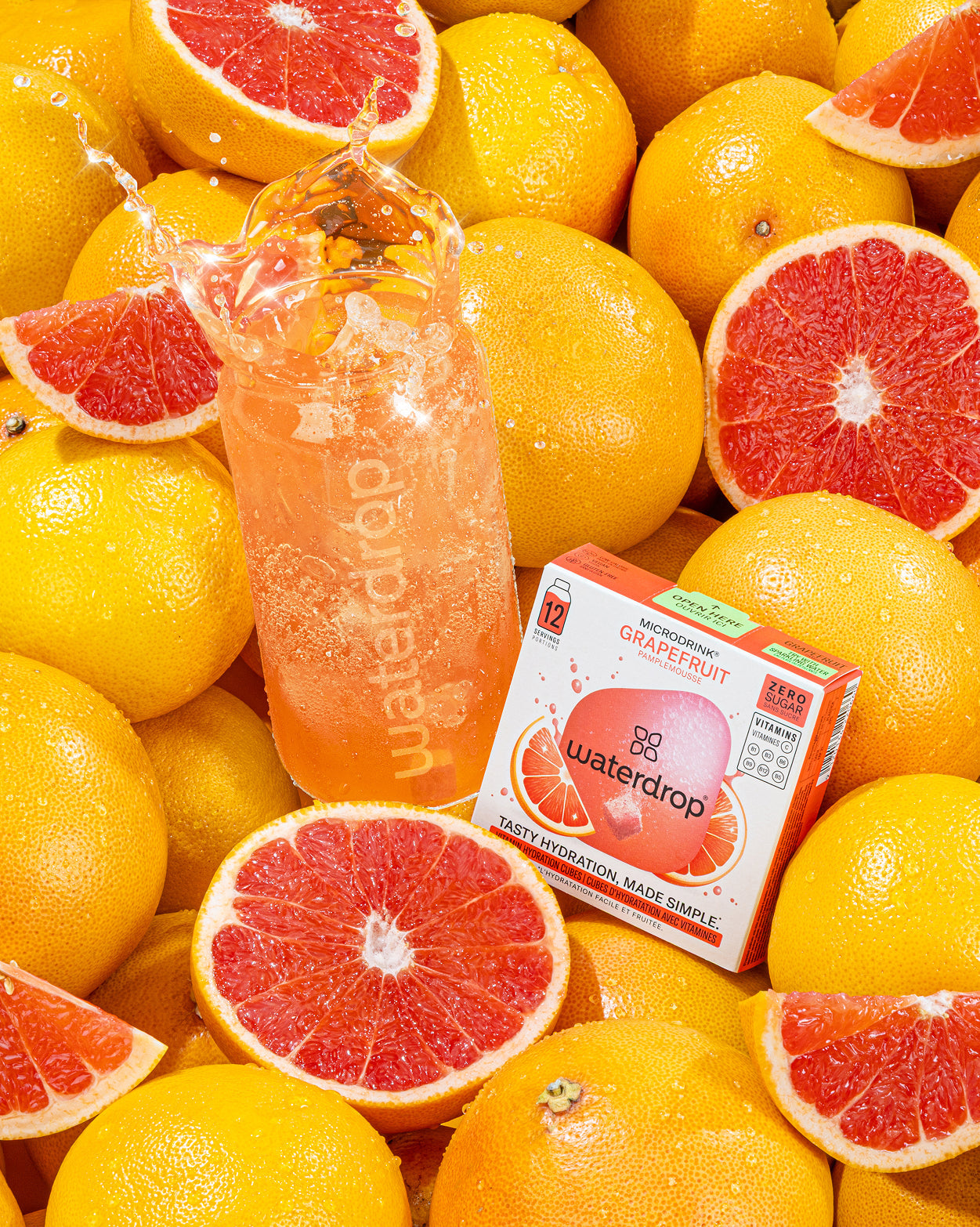 GRAPEFRUIT juice box with citrus fruit close-up.