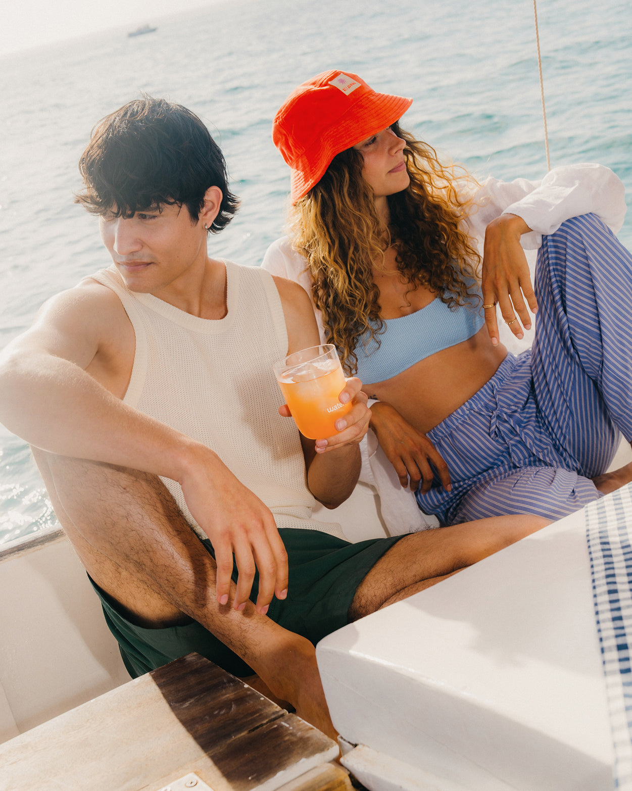 GRAPEFRUIT Microdrink with a man and woman boating.