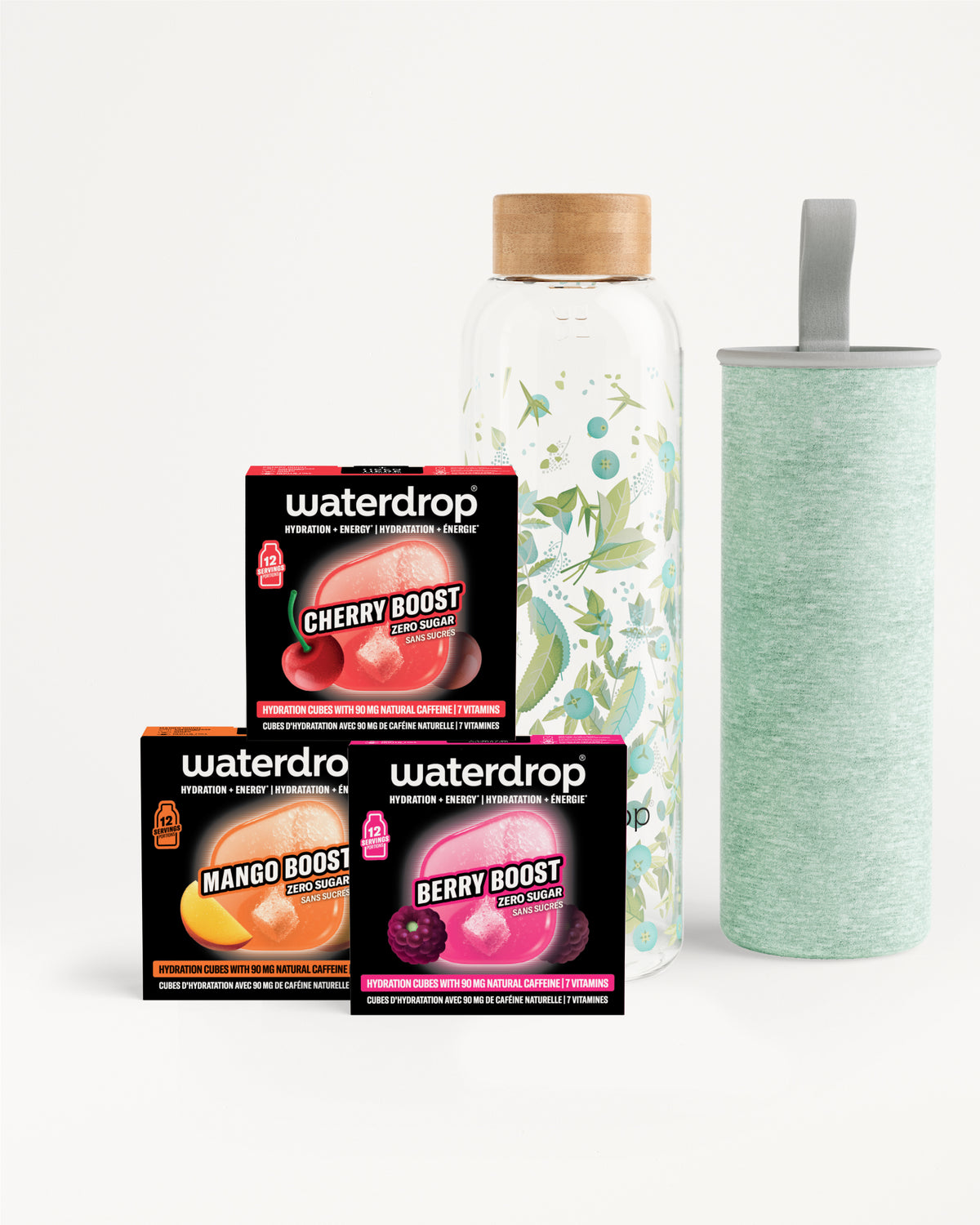 Set of three Waterdrop flavor boost boxes with a glass infuser bottle and a light green tumbler.