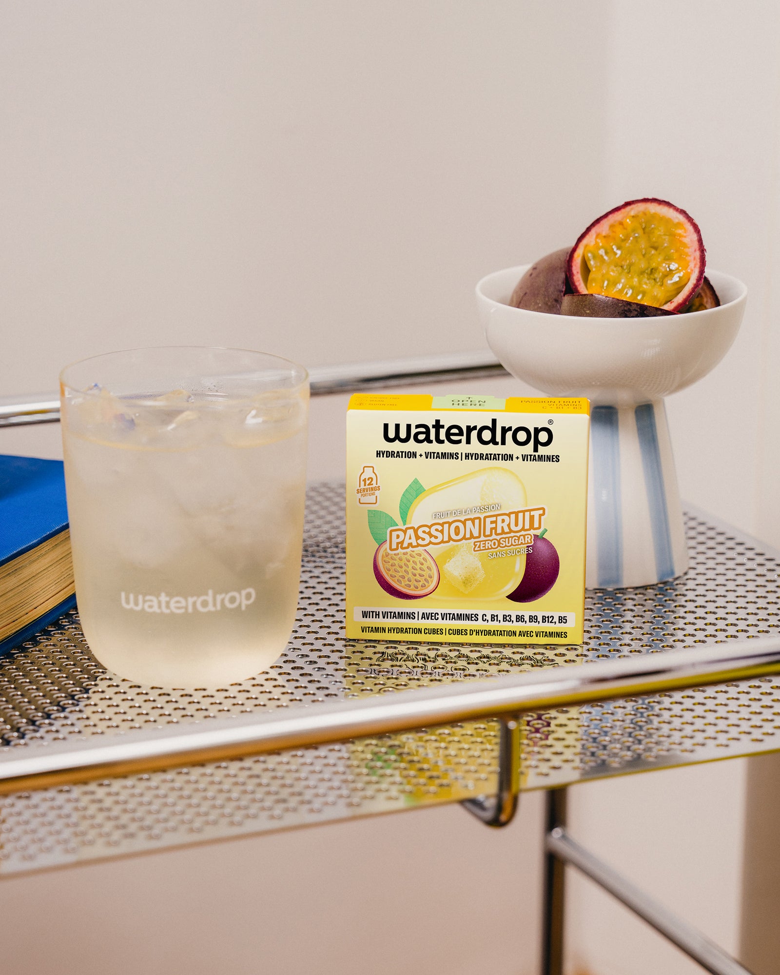 Edition Glass Microdrink Set with passion fruit hydration cubes.