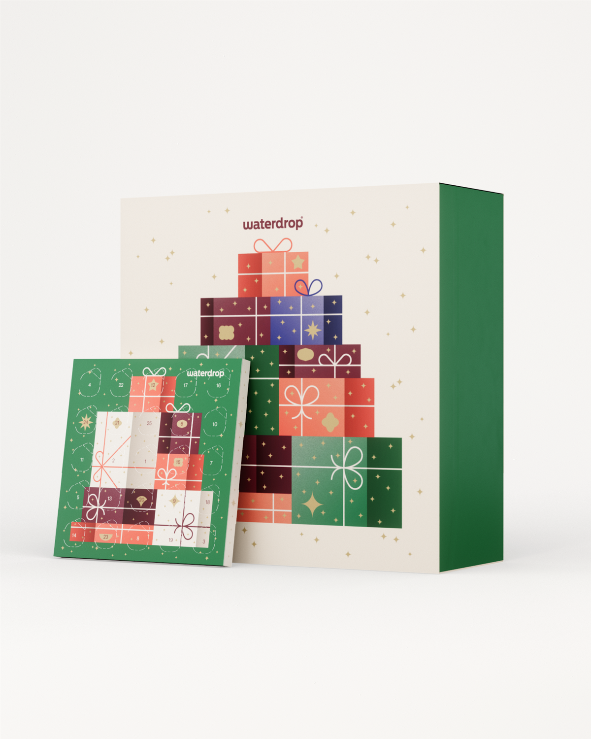 Adventskalenderset van waterdrop® met een grote decoratieve doos en een kleinere adventskalender met 25 genummerde vensters, perfect voor dagelijks decemberplezier en gevuld met favoriete smaken en accessoires.