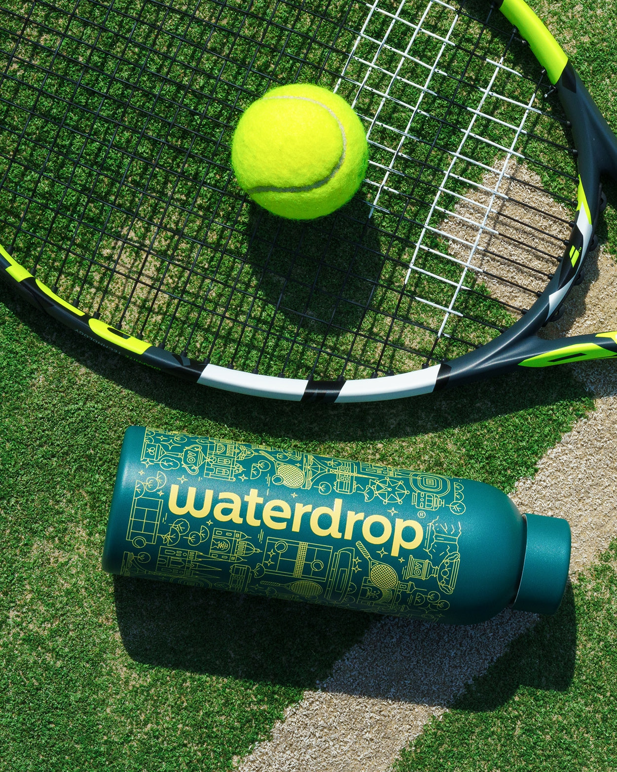 AO26 Family Hydration Set with tennis racquet and ball.