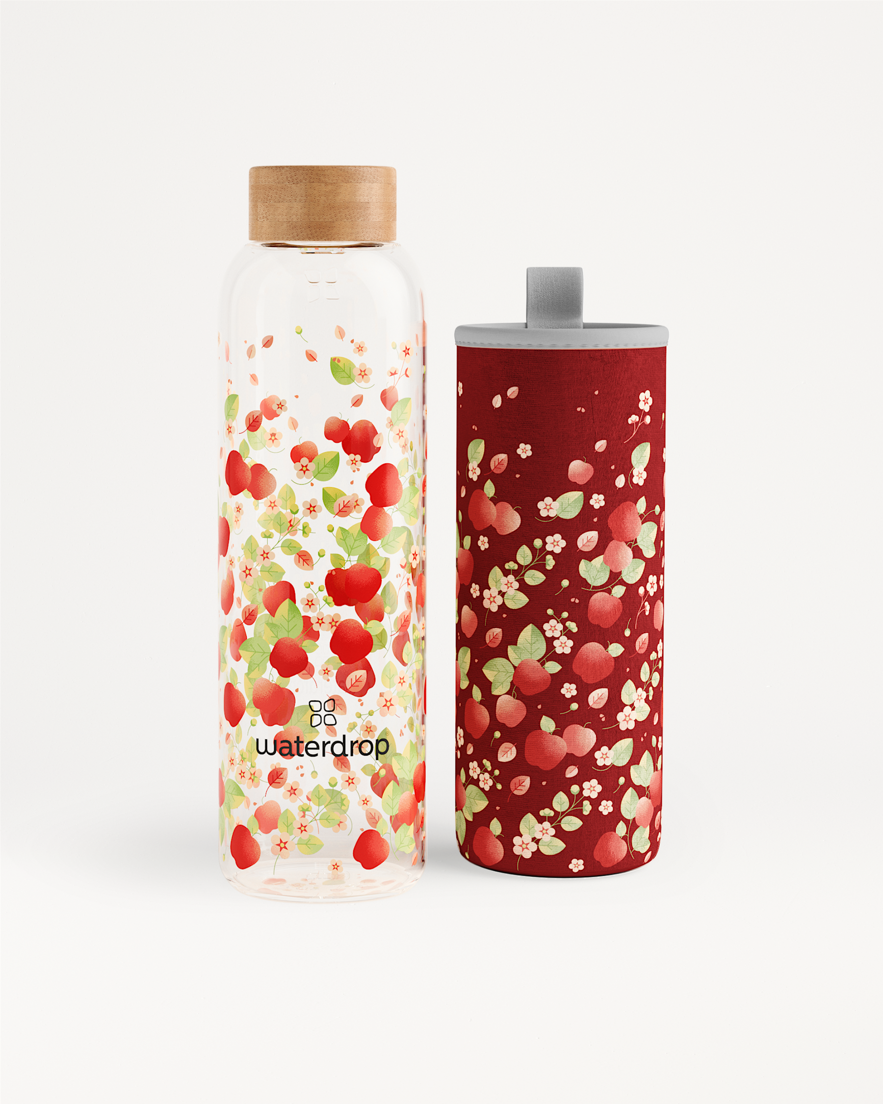 APPLE Edition Glass bottle with fruit pattern and matching red sleeve.