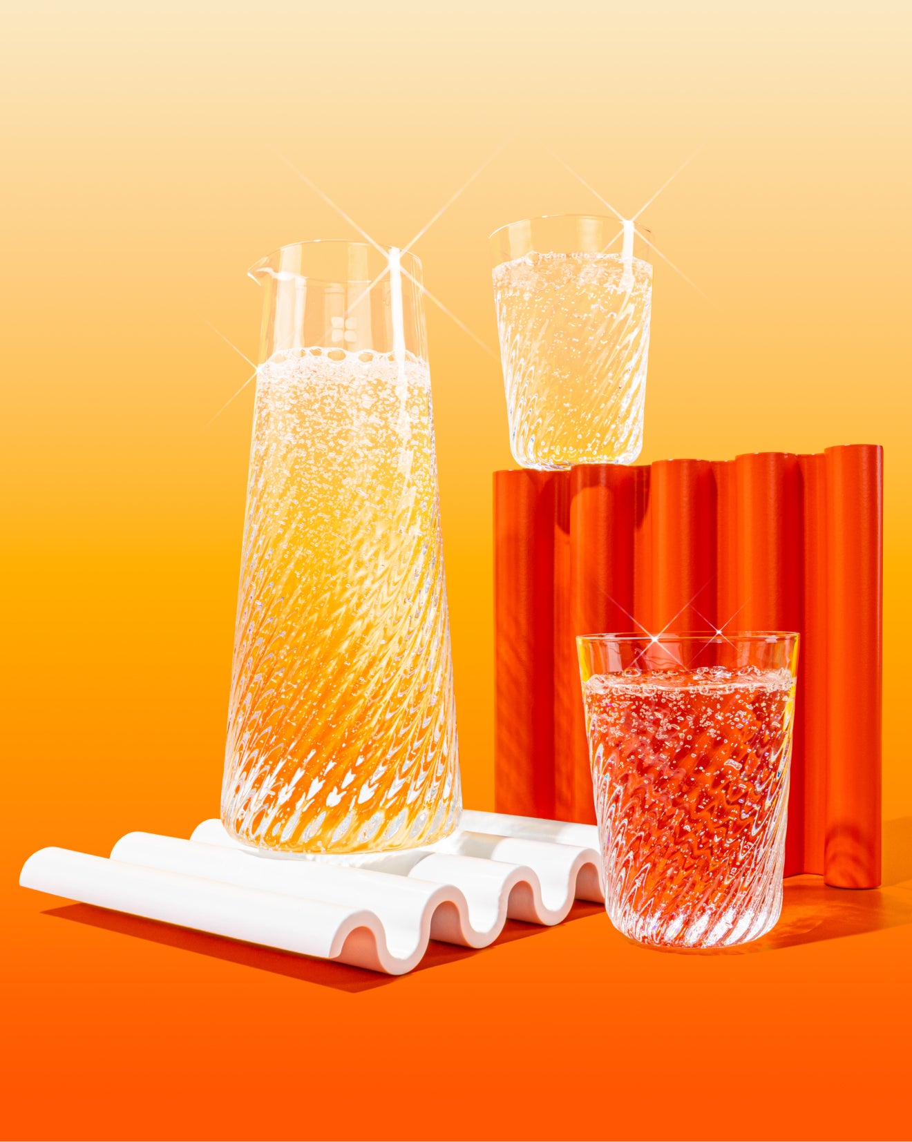 Rippled Carafe Set with fizzy drinks in textured glassware.