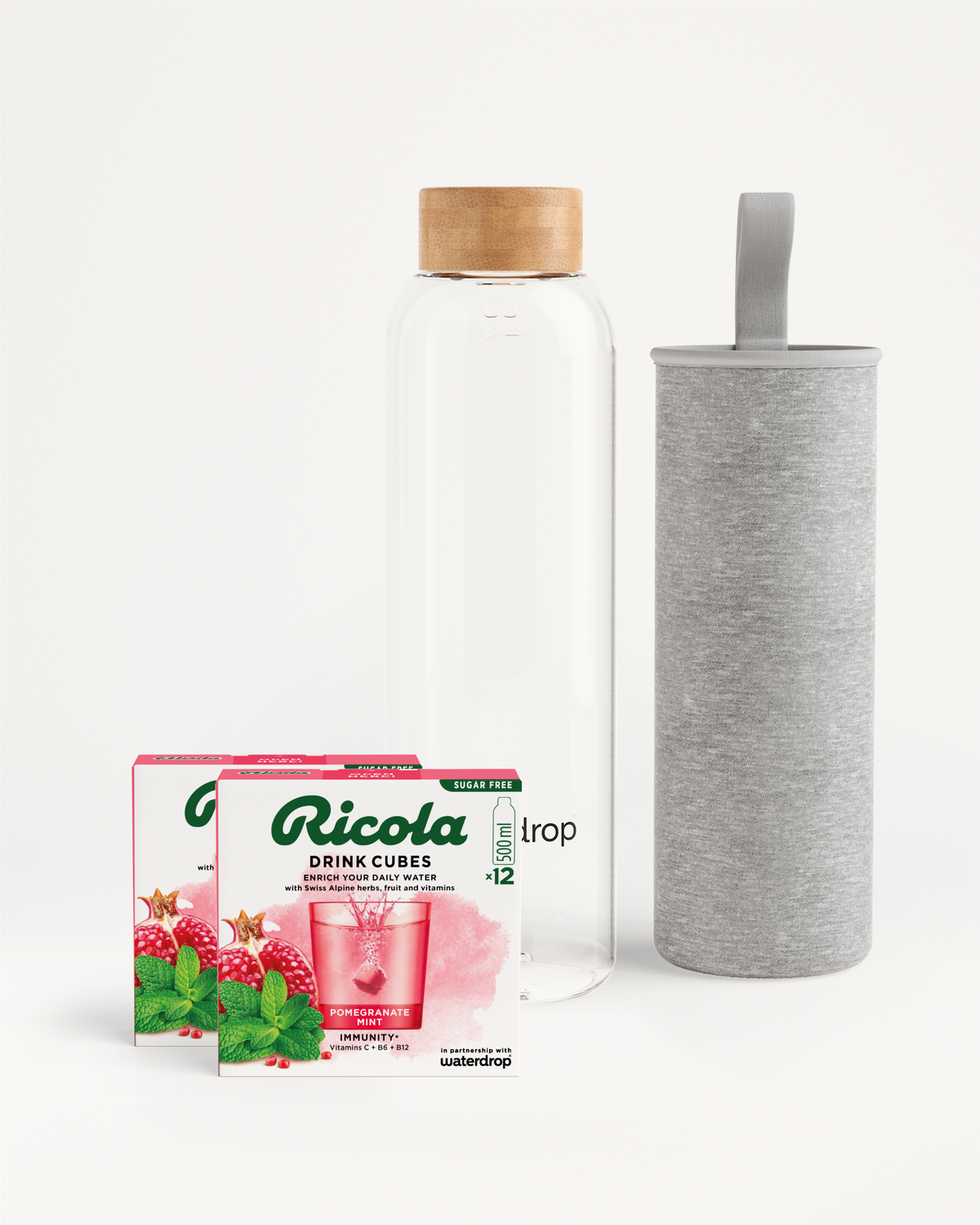 Ricola Bottle Set: Glass bottle with sleeve, Ricola Drink Cubes.