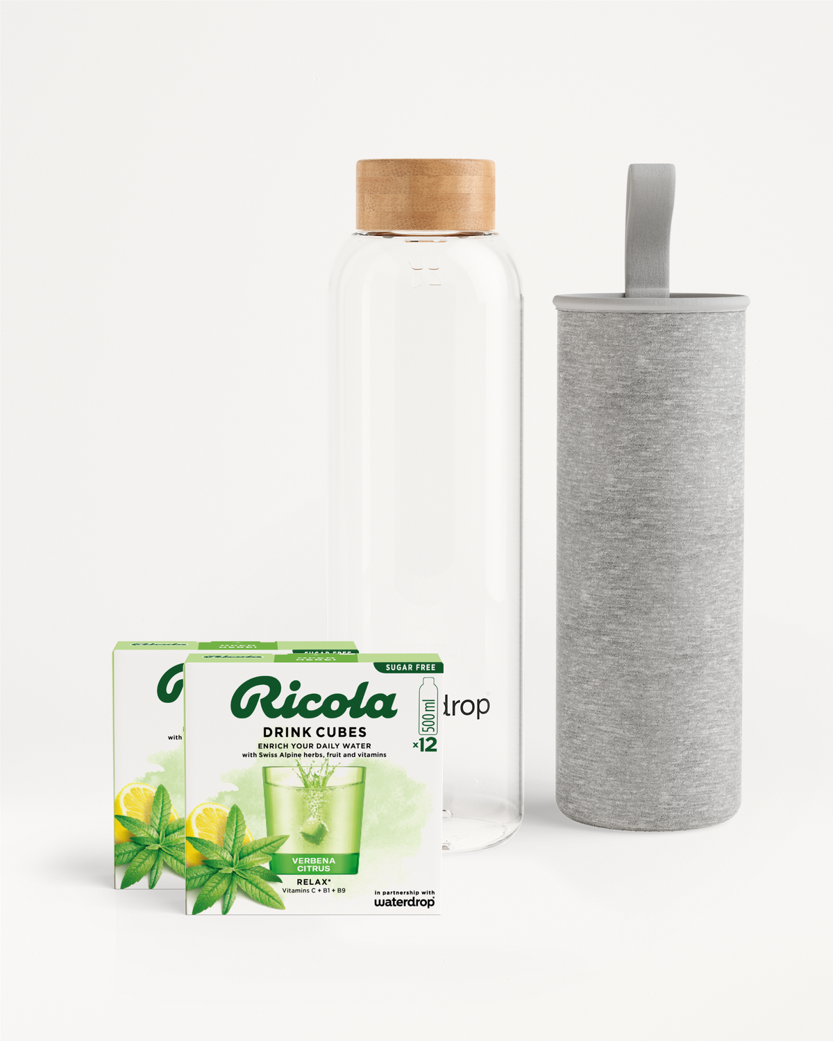 Ricola Bottle Set with flavor cubes and glass bottle.