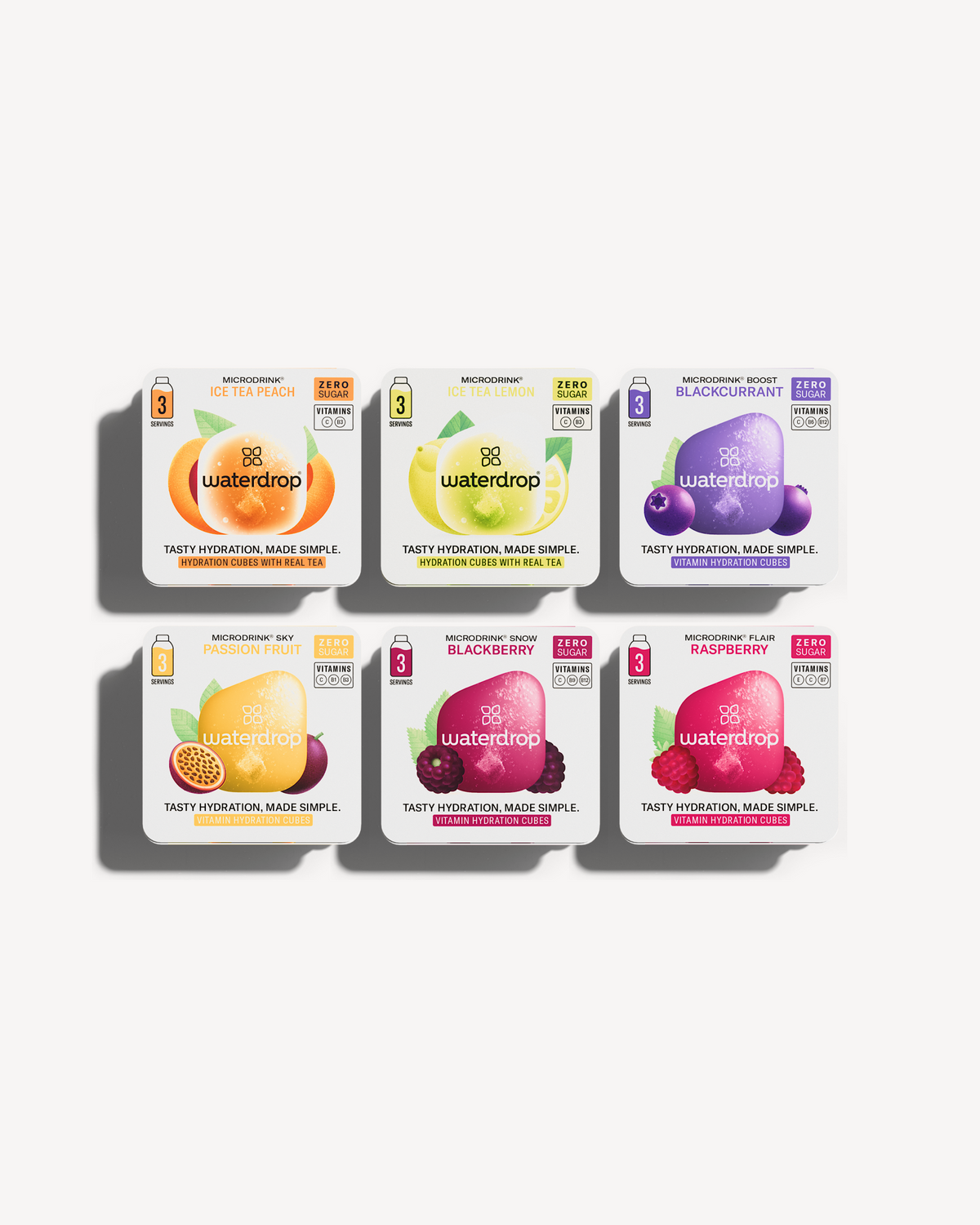 Microdrink Taster Pack featuring six white square boxes with various fruit labels, offering different natural fruit and plant extract flavors for refreshing water.