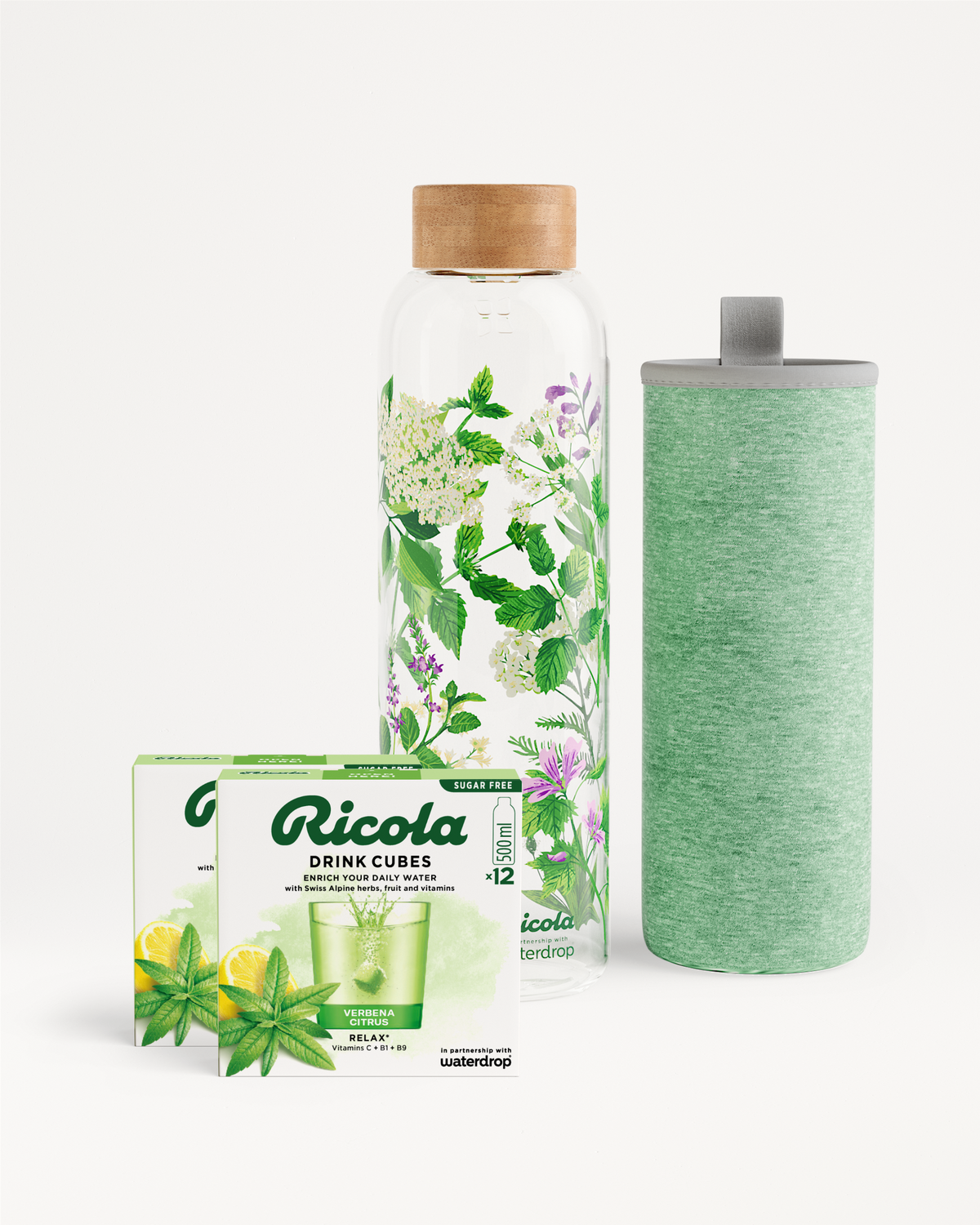 Ricola Bottle Set with Verbena Citrus Drink Cubes and glass bottle.