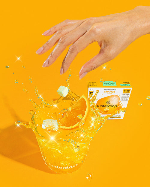 Citrus Trio Set Microdrink in hand, showcasing juicy flavors.