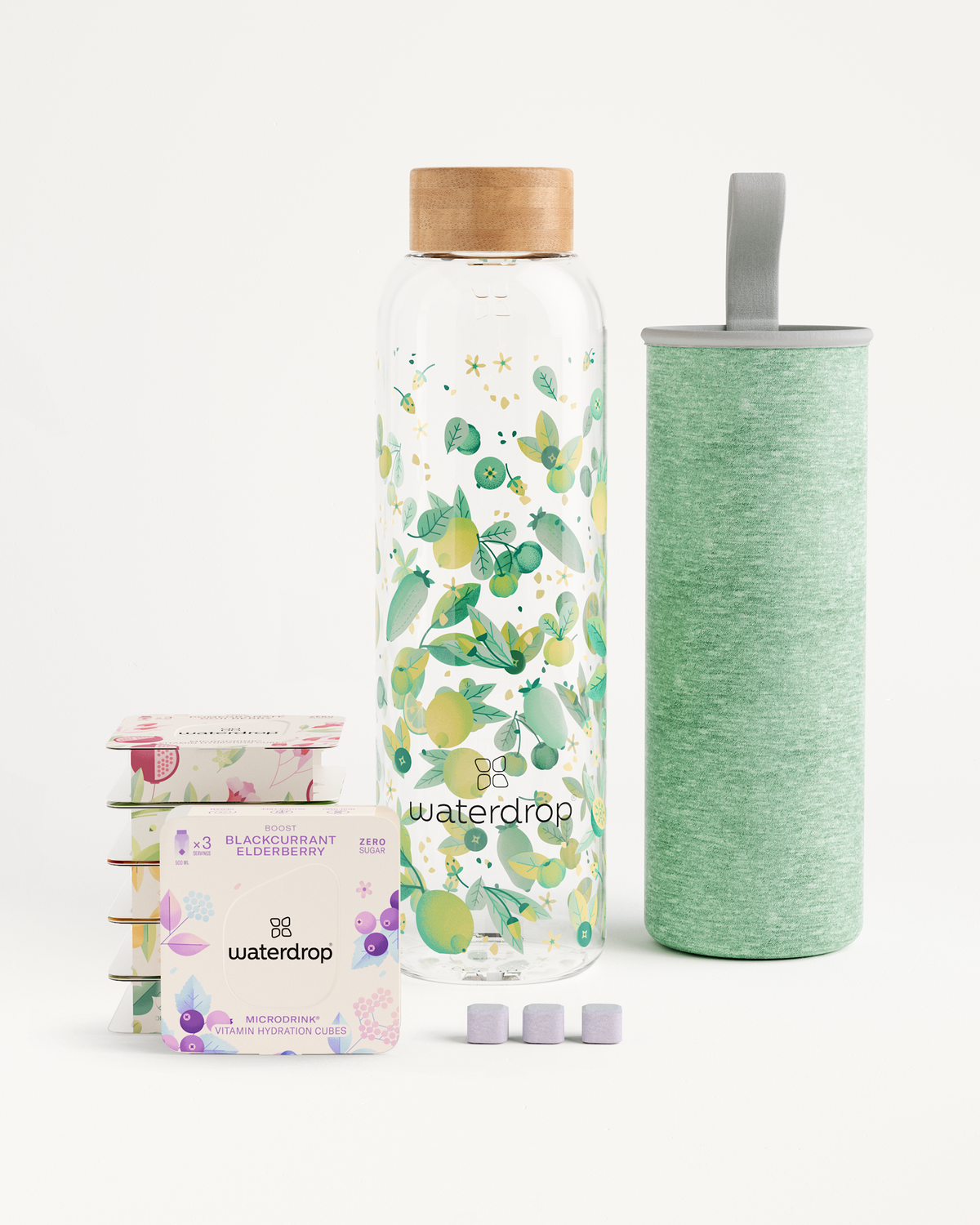 Starter Set Microdrink Glass featuring a 600ml borosilicate glass bottle with fruit design and an elderberry flavored liquid box.