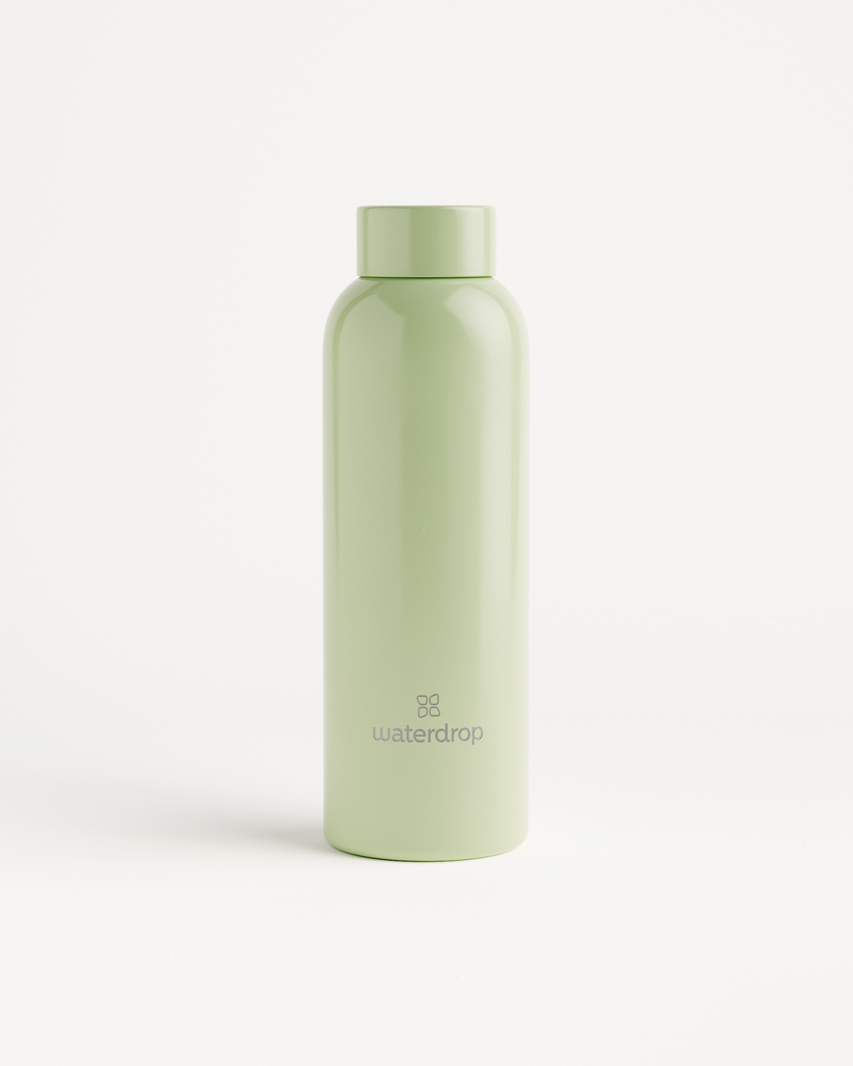 Pastel Glossy waterdrop thermo steel bottle - a white, cylindrical stainless steel hydration sleeve with a secure lid, showcased in a close-up image.