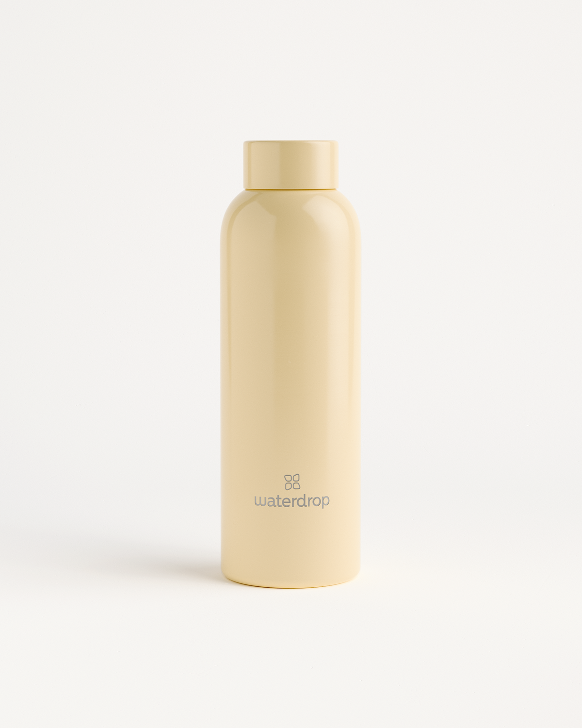 Pastel Glossy Thermo Steel Bottle - a white, cylindrical stainless steel hydration container with a secure lid, showcased in a close-up image.