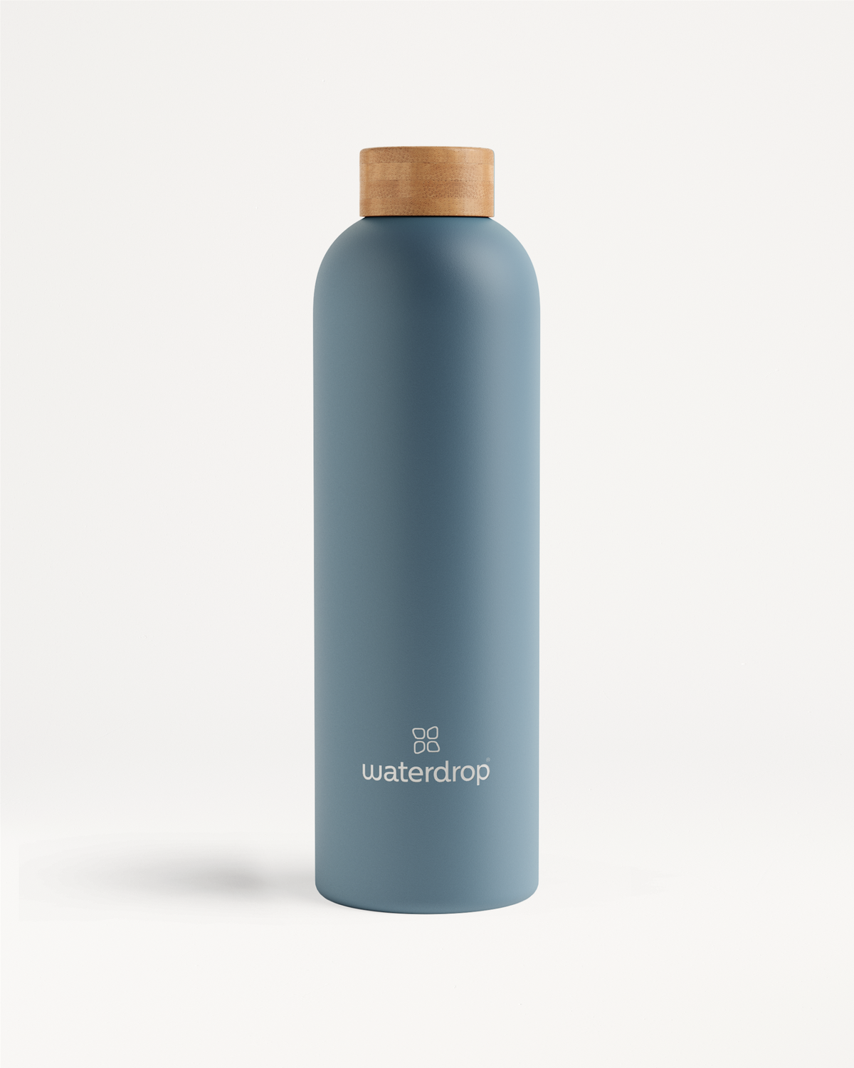 Thermo Steel bottle with wooden cap, designed for maintaining drink temperature, available in 400ml, 600ml, or 1L sizes.