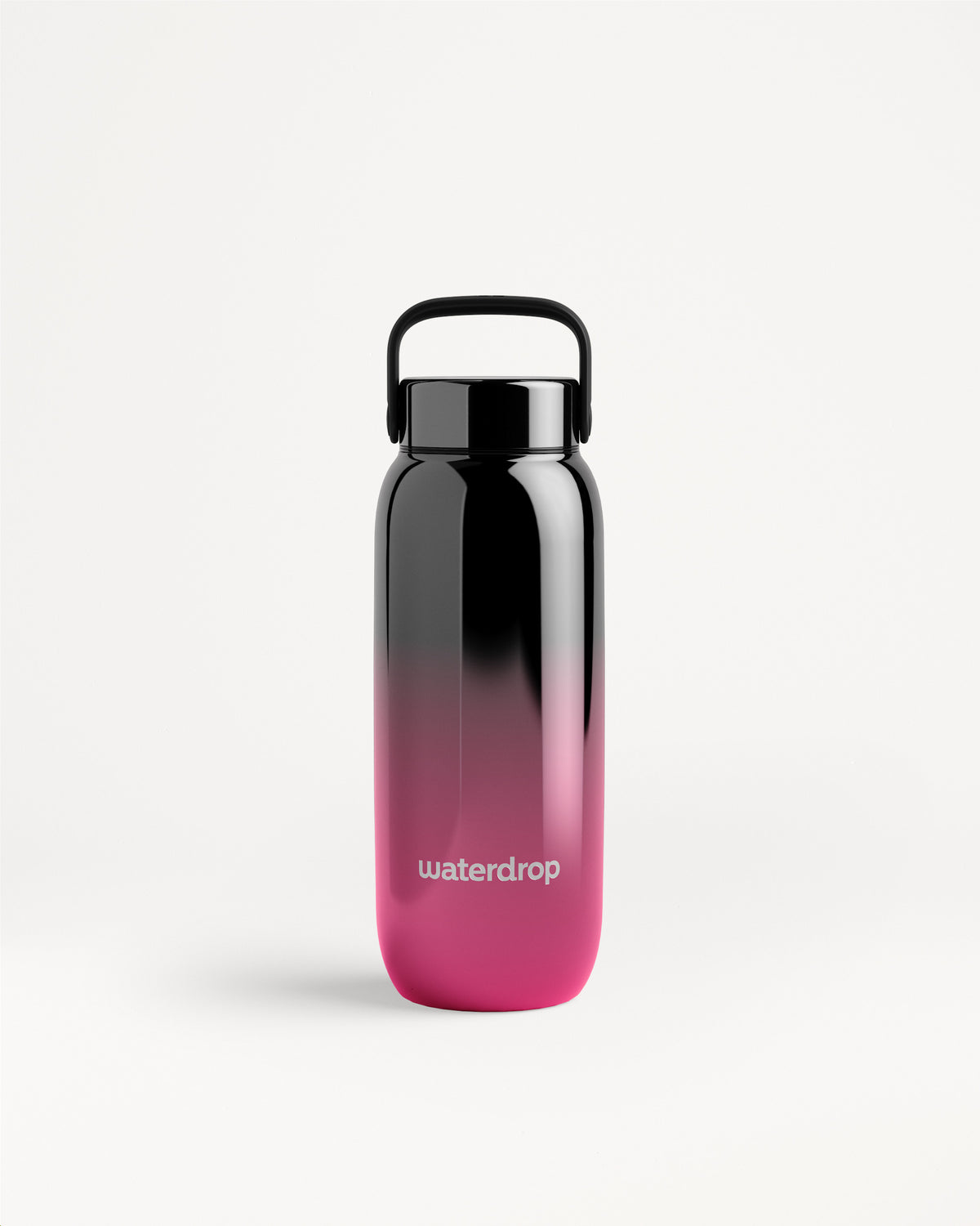 Gradient black-to-pink water bottle with a black cap and carrying handle.