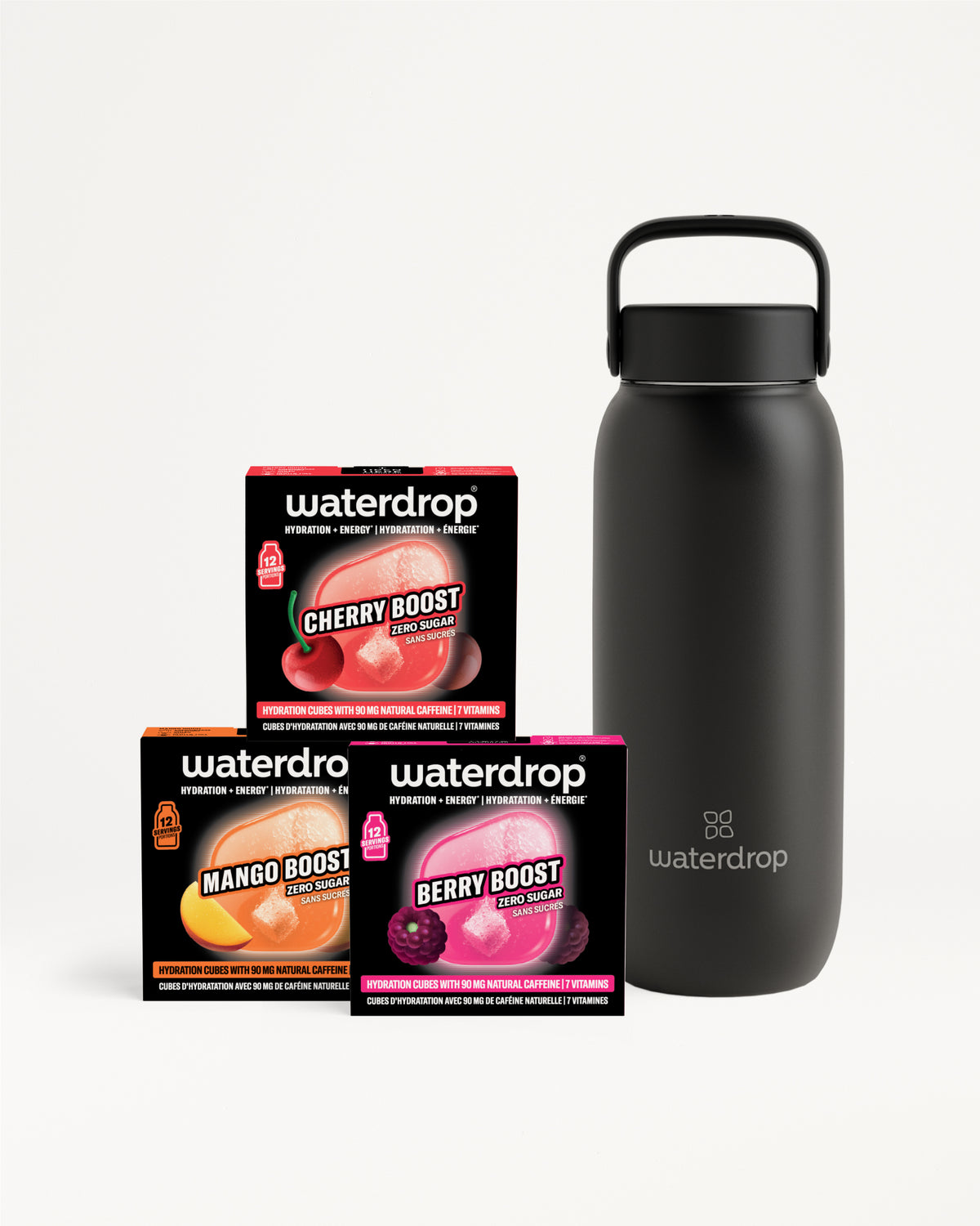 Dark gray reusable water bottle with a handle beside three boxed flavor boosters.