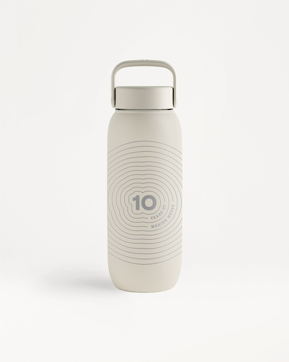 Beige reusable water bottle with a metal loop cap and concentric circle pattern.