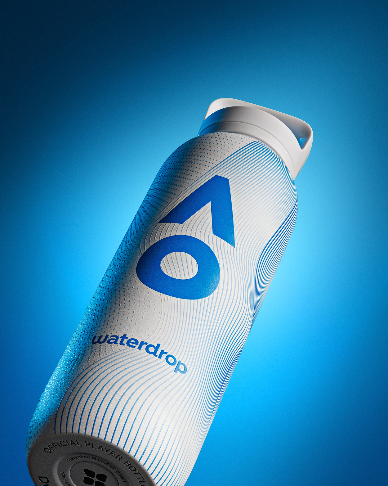 Diagonal view of a white and blue sport water bottle with a handle on a blue gradient background.