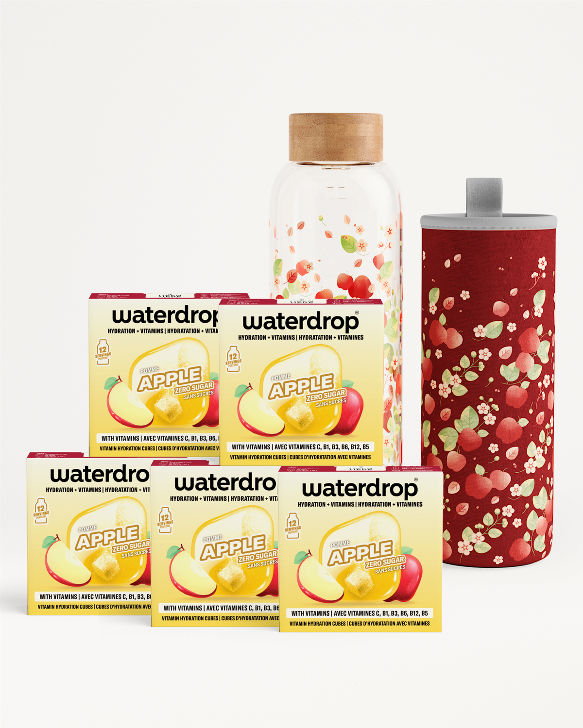 Assorted Waterdrop products with boxes and bottles, a wooden-capped bottle, and a red patterned tumbler.