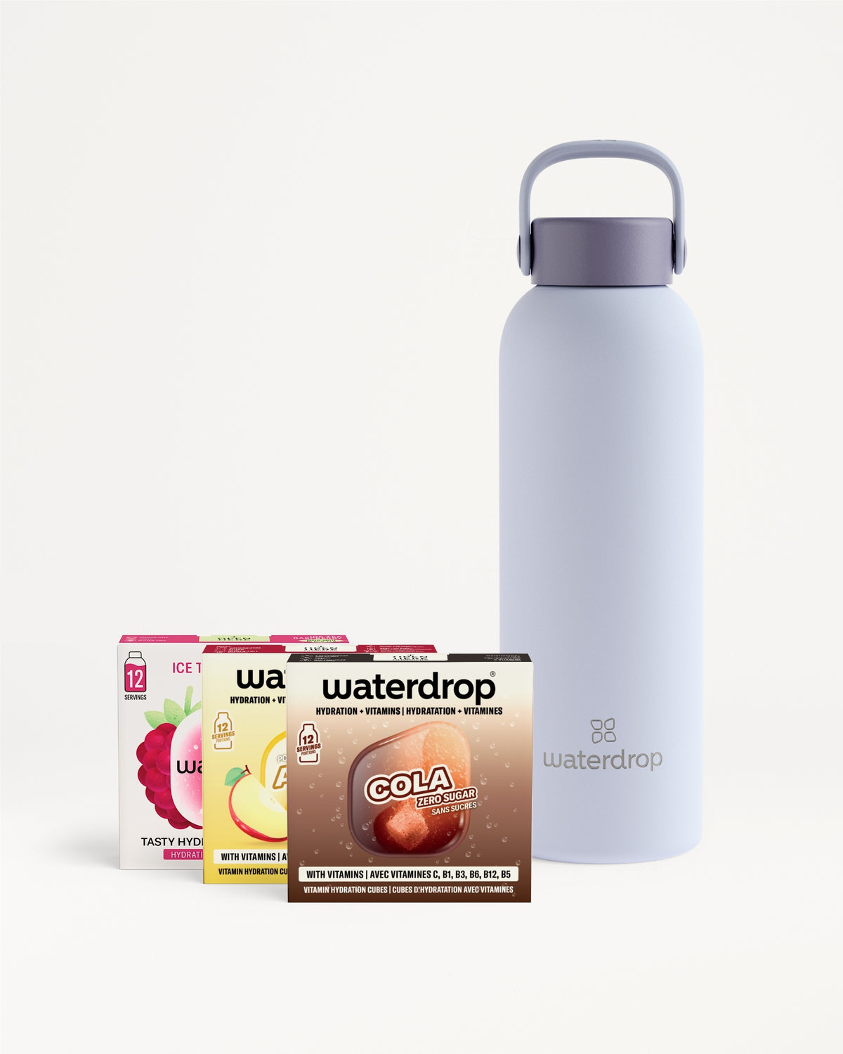 Assorted juice boxes placed beside a light blue reusable water bottle.