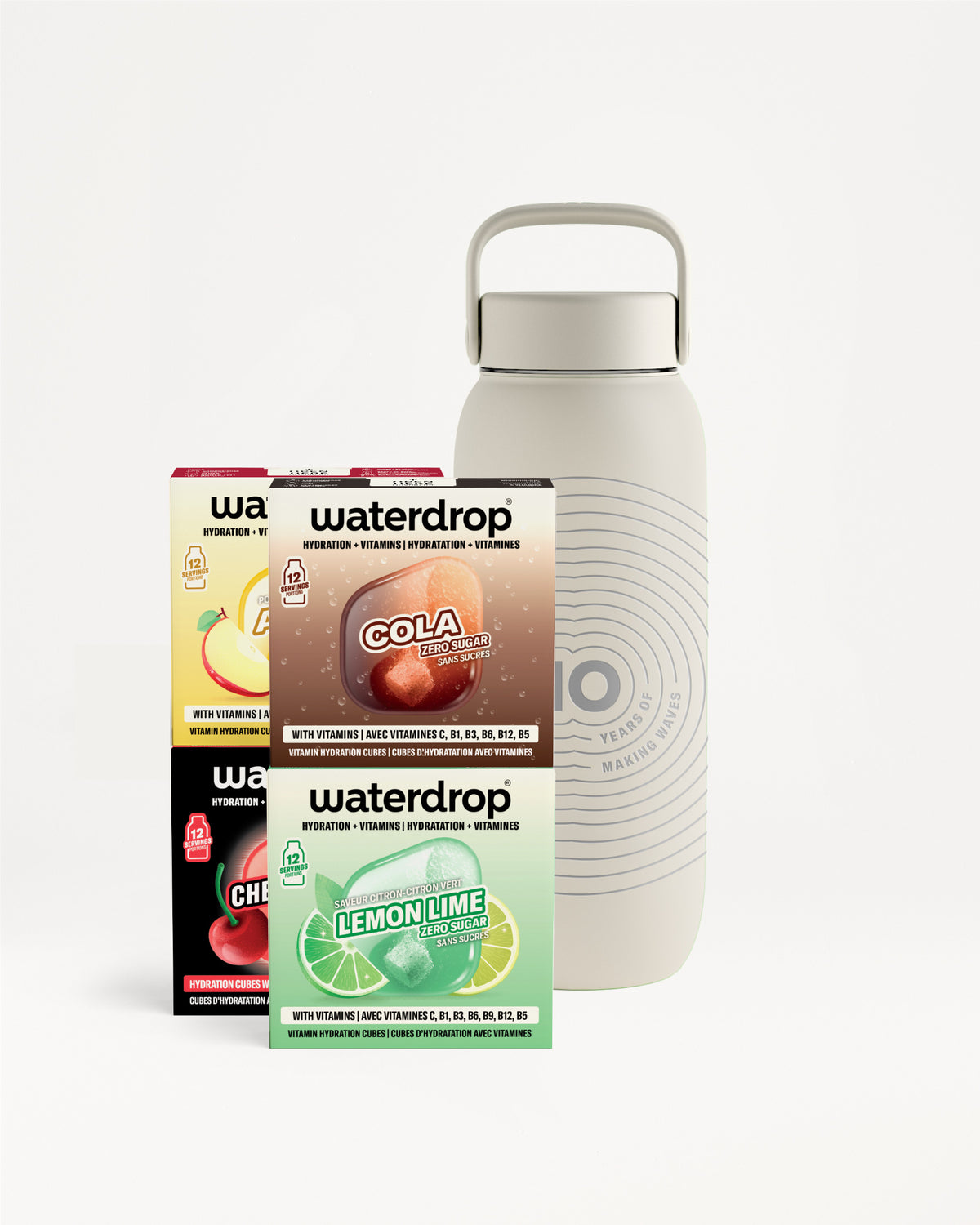 Light gray reusable bottle with a handle beside three flavor mix boxes.
