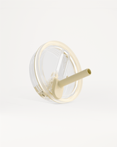 Transparent spill-proof lid with a beige gasket and built-in straw for a reusable cup.