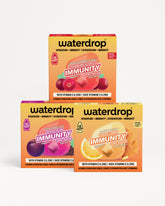Three Waterdrop immunity product boxes stacked in a pyramid against a white background.