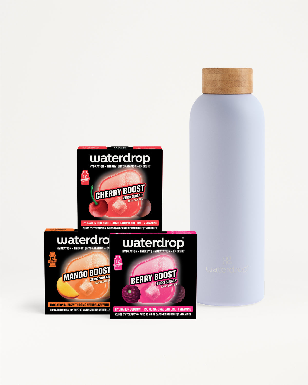 Assorted Waterdrop drink mix boxes stacked beside a tall light purple bottle with a cork lid.