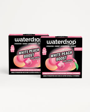 Two black Waterdrop hydration product boxes with pink accents on a white background.