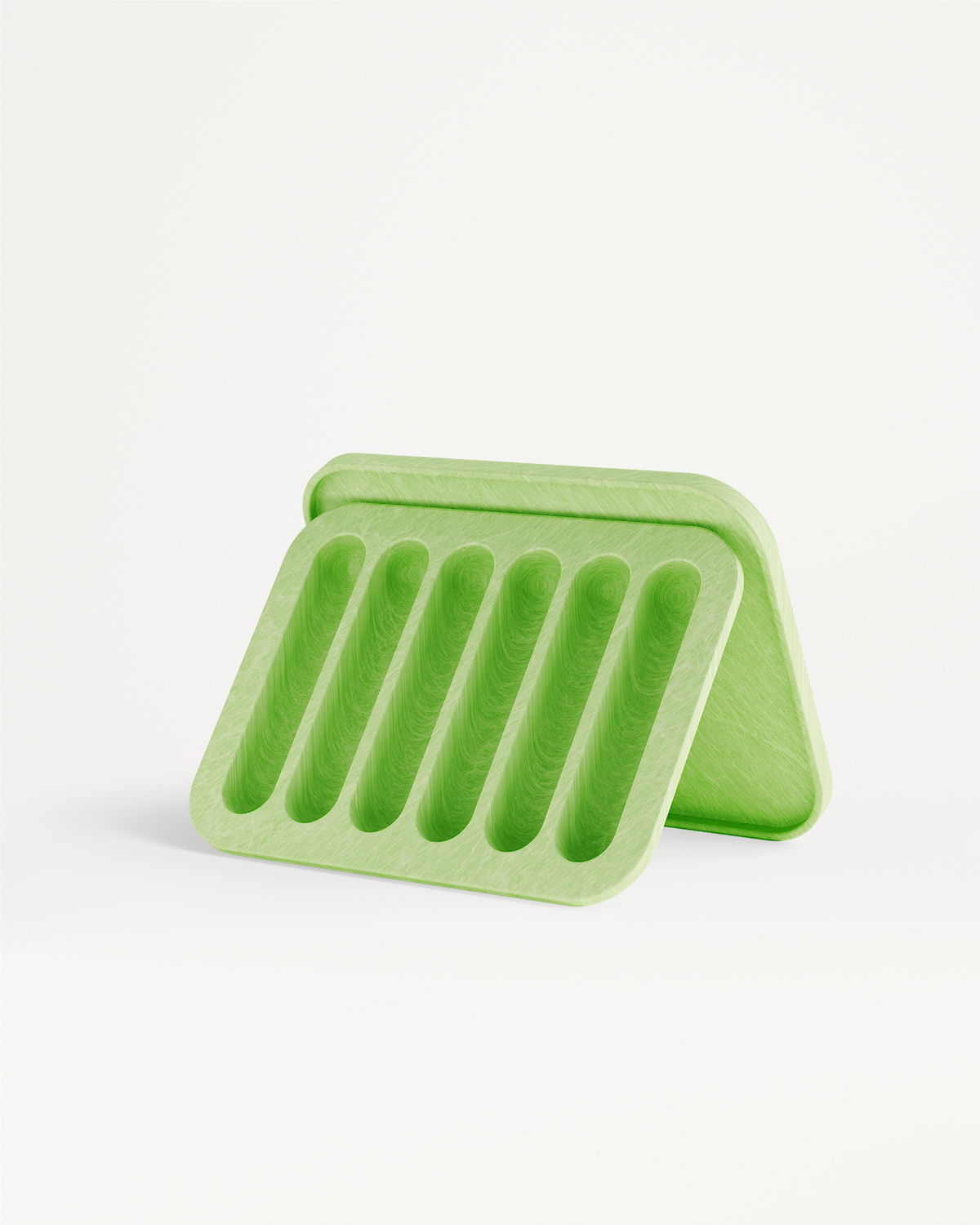 Green plastic Ice Tray with holes, designed to create six ice sticks for perfectly chilled Microdrinks. Ideal for summer hydration and compatible with waterdrop® bottles.