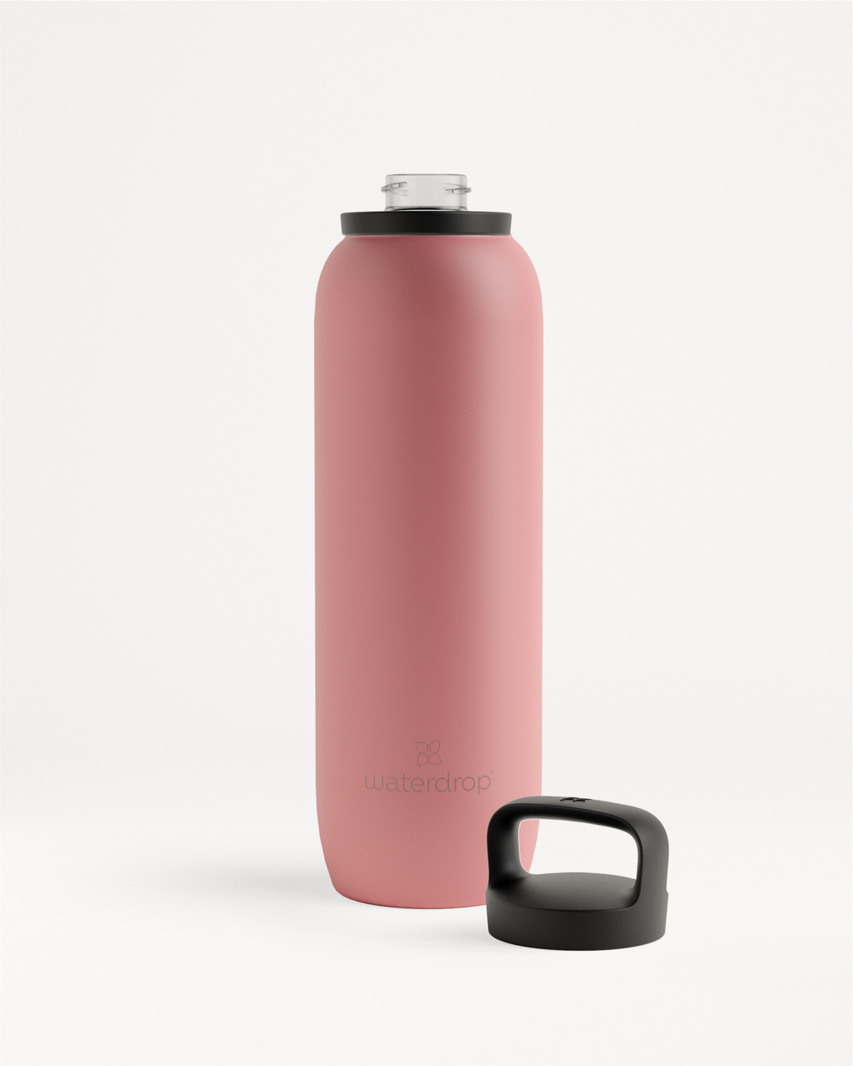 All-Purpose Thermo · Spout Lid, a pink stainless steel water bottle with a black cap, ideal for keeping drinks ice-cold up to 24 hours.