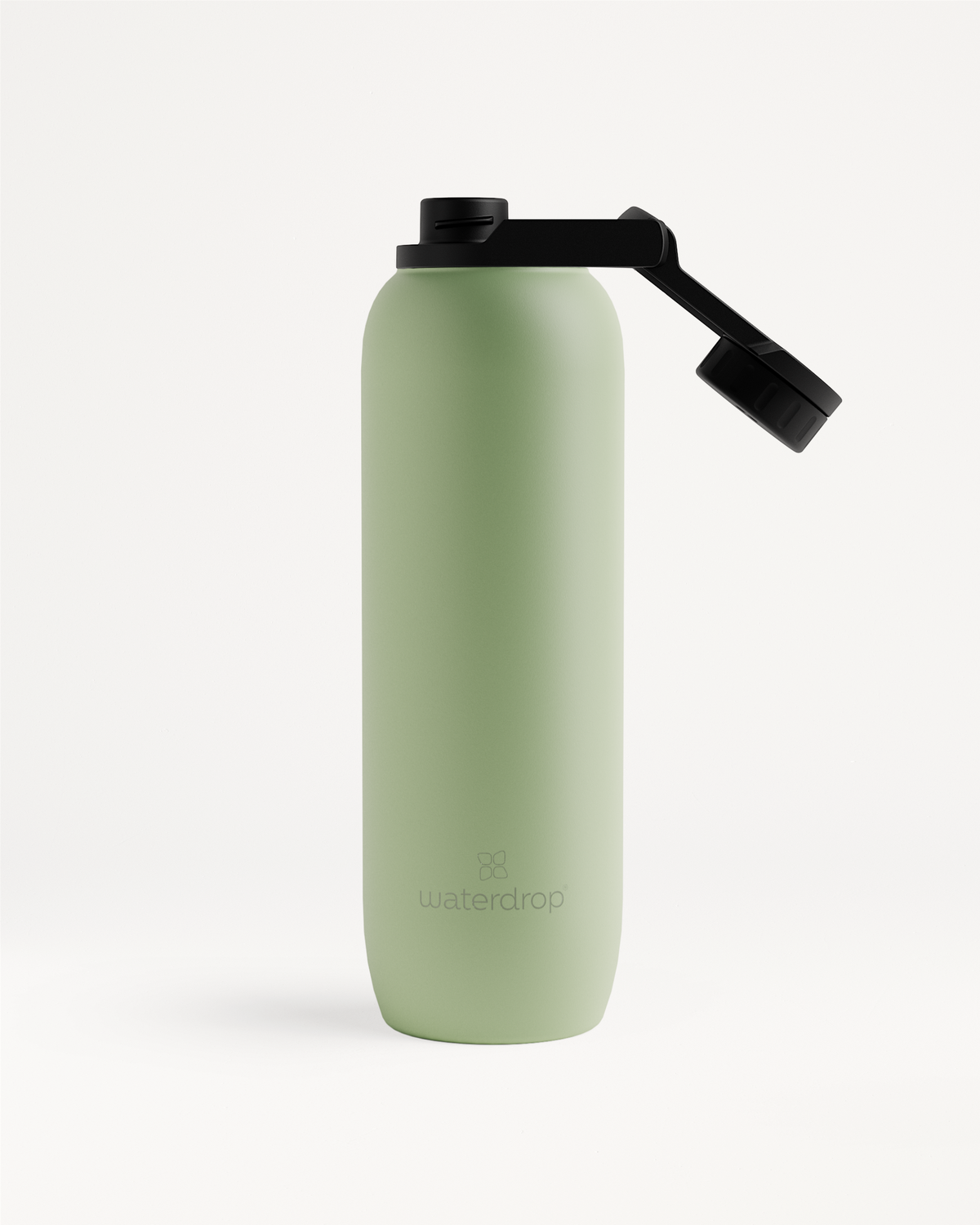 All-Purpose Thermo · Swing Lid: A vacuum-insulated green water bottle with a black cap, designed for long-lasting cold hydration.