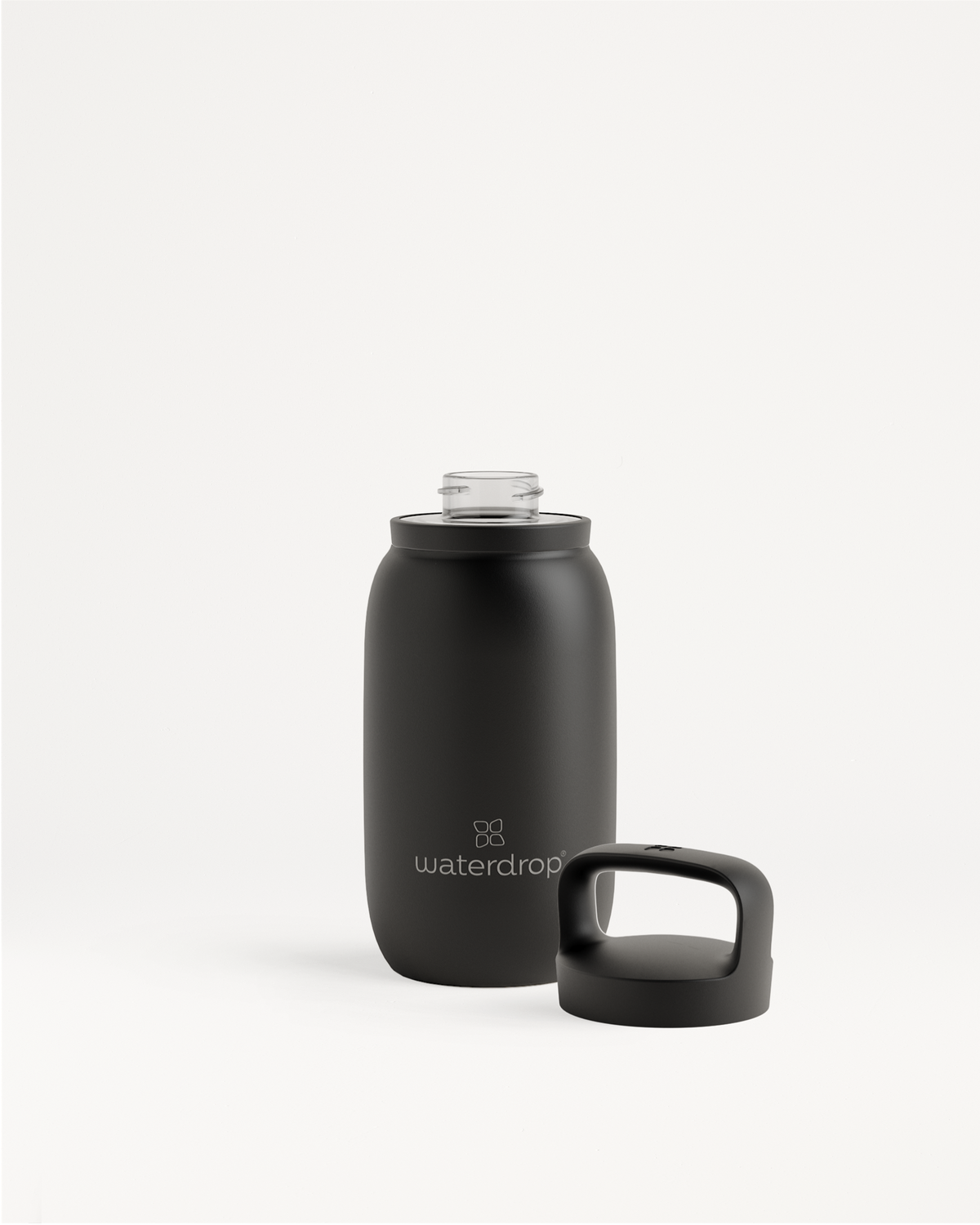 All-Purpose Thermo Spout Lid bottle, double-walled stainless steel, with a handle and wide opening for ice cubes.