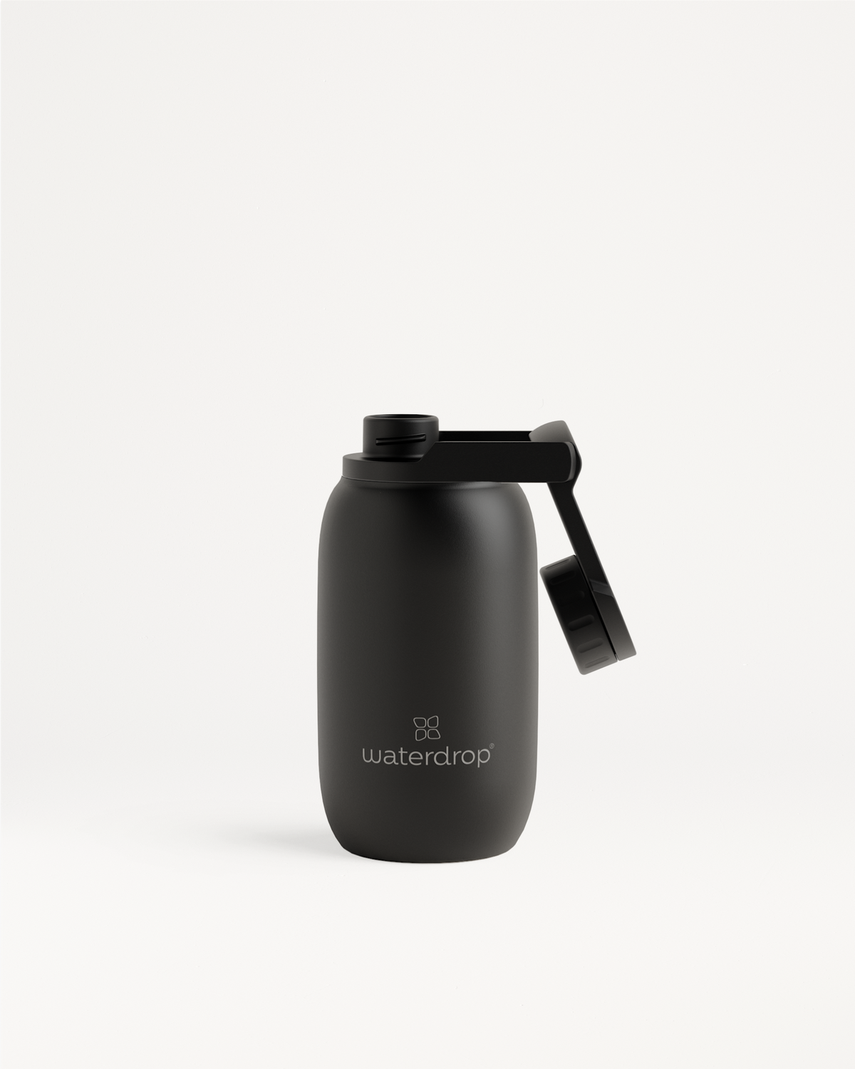 All-Purpose Thermo · Swing Lid - Black vacuum-insulated water bottle with a handle and attached cap, featuring a white logo.