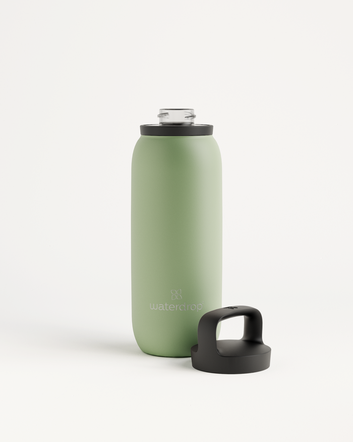 All-Purpose Thermo · Spout Lid: A green, double-walled stainless steel water bottle with a black cap, featuring an extra-large opening for ice cubes.