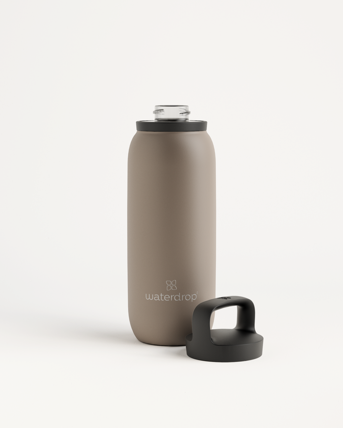 All-Purpose Thermo with Spout Lid, a double-walled stainless steel water bottle with a black cap and extra large opening for ice cubes.