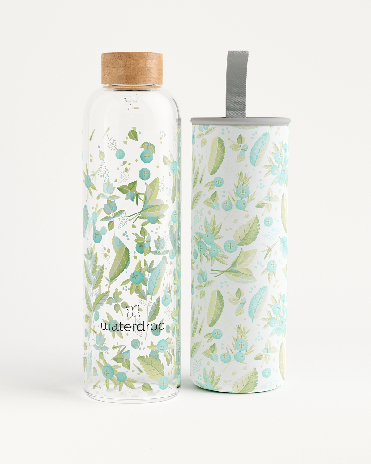 Edition Glass bottle with a lid, made of robust borosilicate glass, designed for portable hydration and eco-friendly use. Available in 400ml, 600ml, and 1L.