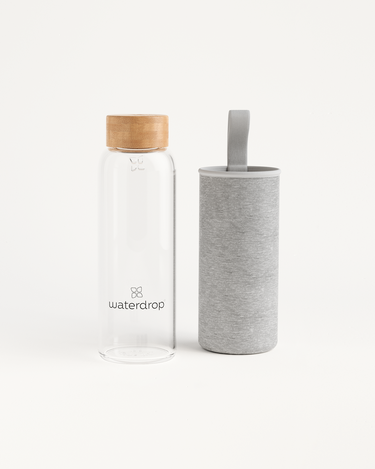 Clear Glass Bottle with a minimalist design, perfect for daily hydration. Available in 400ml, 600ml, and 1L sizes.