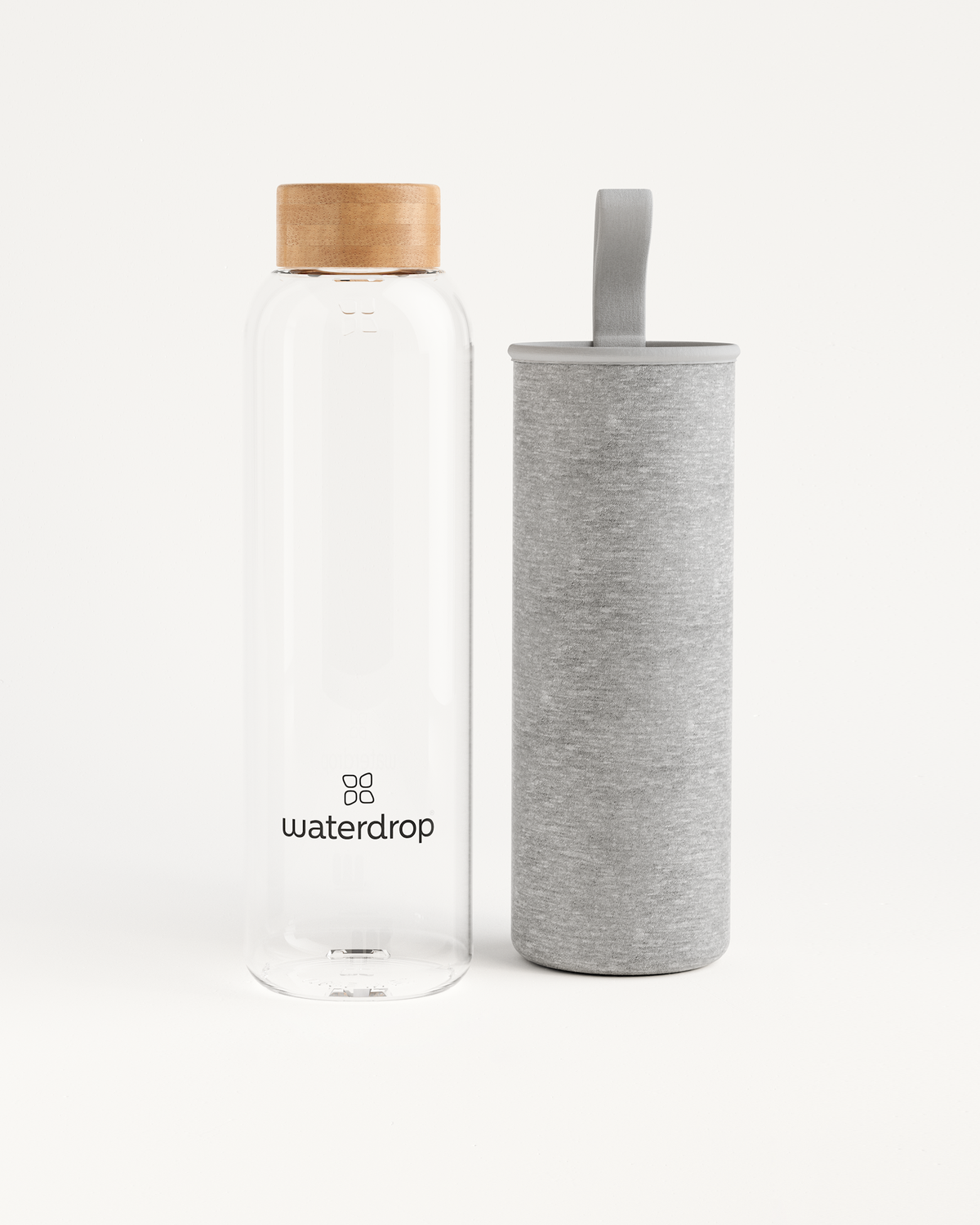 Clear Glass Bottle with a sleek minimalist design, ideal for daily hydration, available in 400ml, 600ml, and 1L sizes.