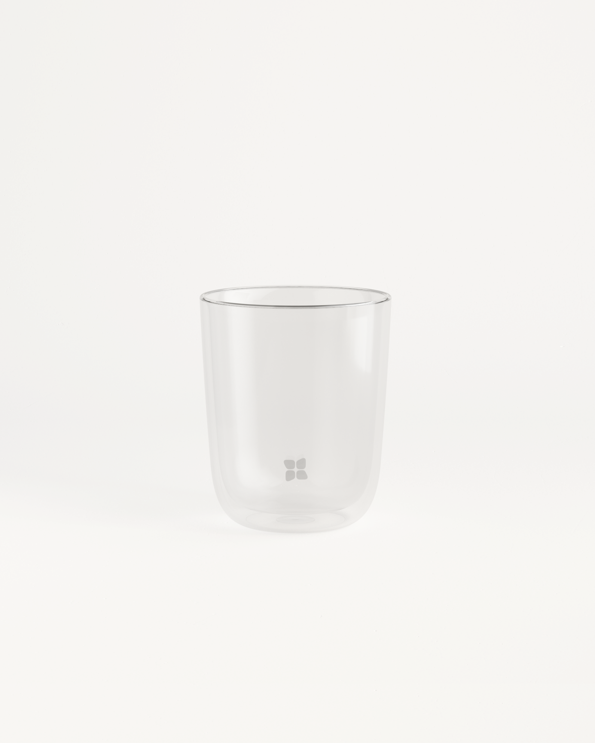 Glass Cup with a silver rim, made of double-walled borosilicate glass for enhanced drinking comfort, especially when paired with the Sip Lid.