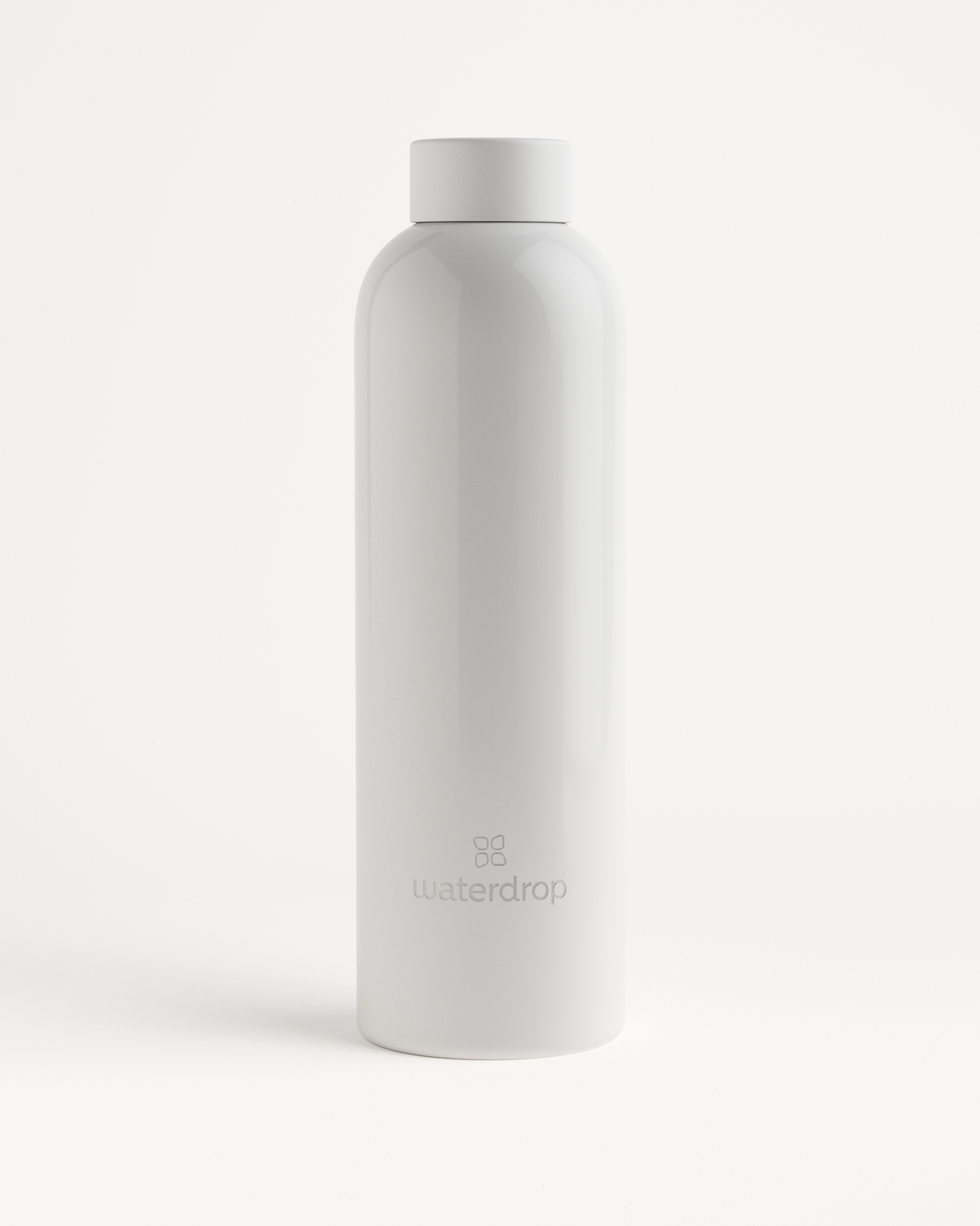 Glossy Thermo Steel: A white, double-walled stainless steel drinking bottle with a cap, designed to keep beverages cold for 24 hours or hot for 12 hours.