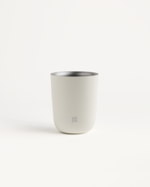 Steel Cup with embossed logo, stainless steel interior.