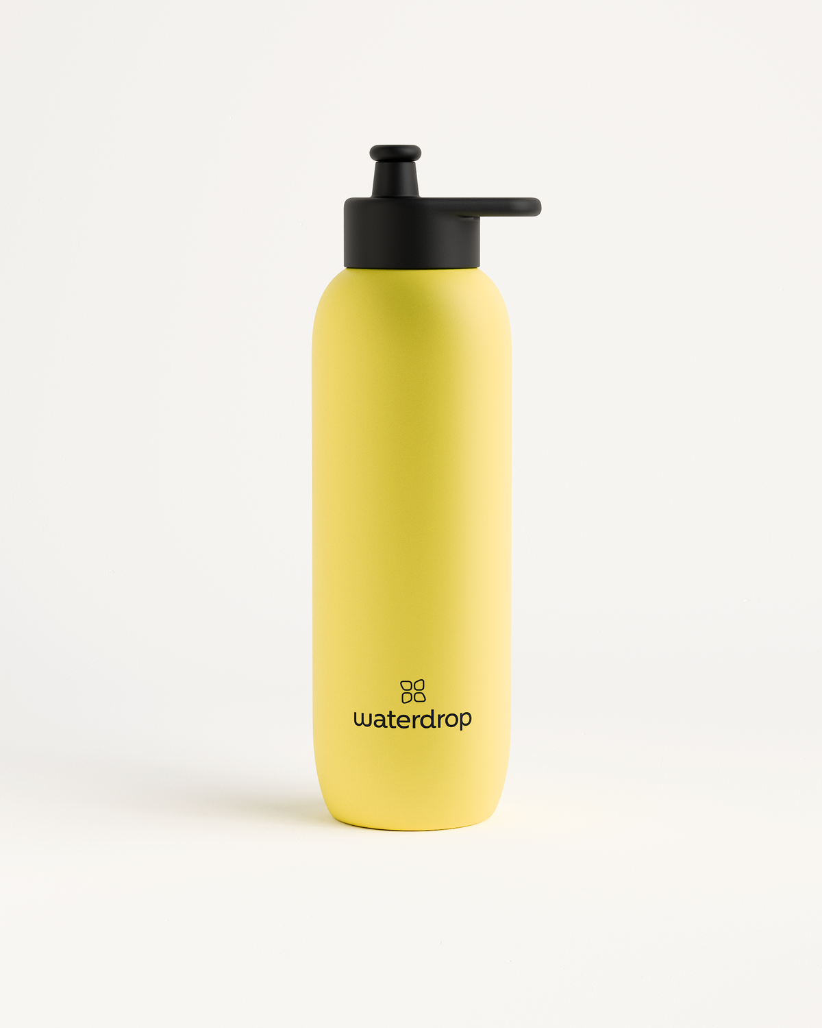 Ultralight Steel yellow water bottle with black lid and Pull-Up Cap for easy drinking during sporting adventures.