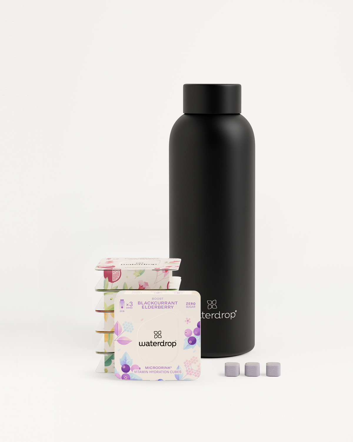 Starter Set Microdrink Thermo Steel featuring a black stainless steel bottle and a box of waterdrop® elderberry-flavored Microdrink cubes.