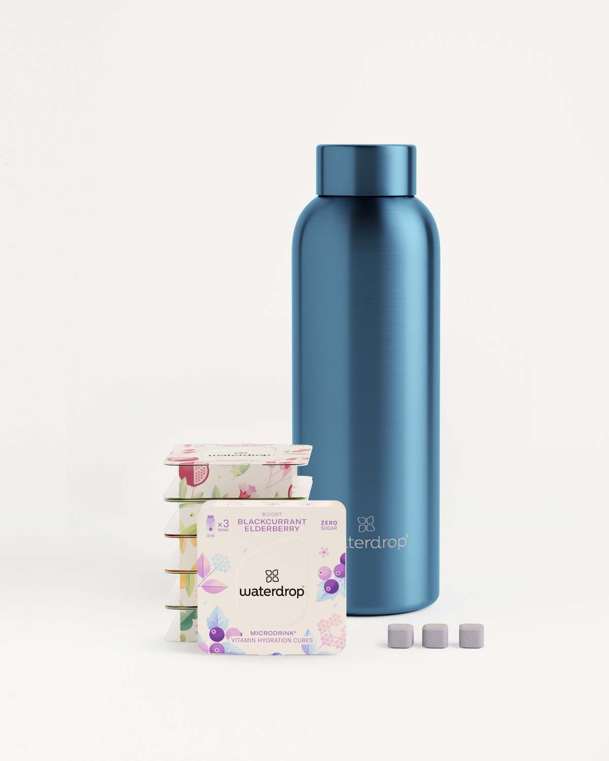 Starter Set Microdrink Metal Thermo Steel with six Microdrink 3-Packs and a stainless steel water bottle. Enjoy hydration solutions anywhere, anytime.