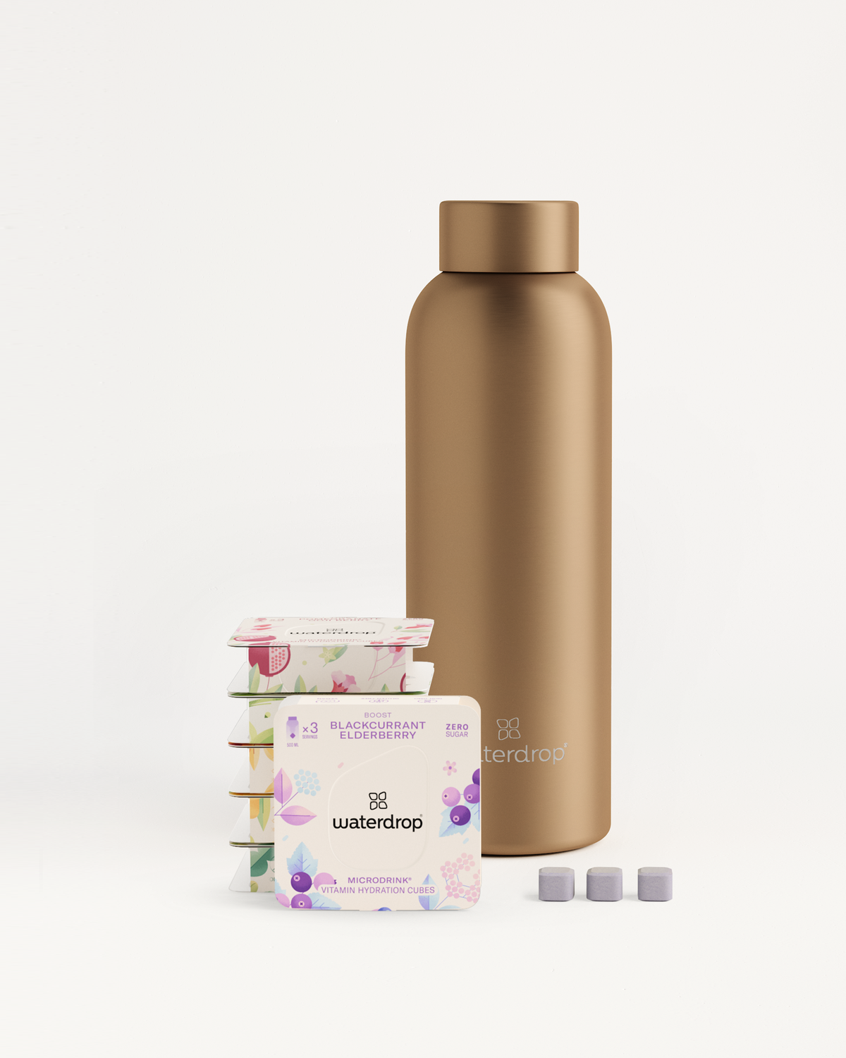 Starter Set Microdrink Metal Thermo Steel: Brown bottle and packages of waterdrop® flavored water cubes, including elderberry flavor.