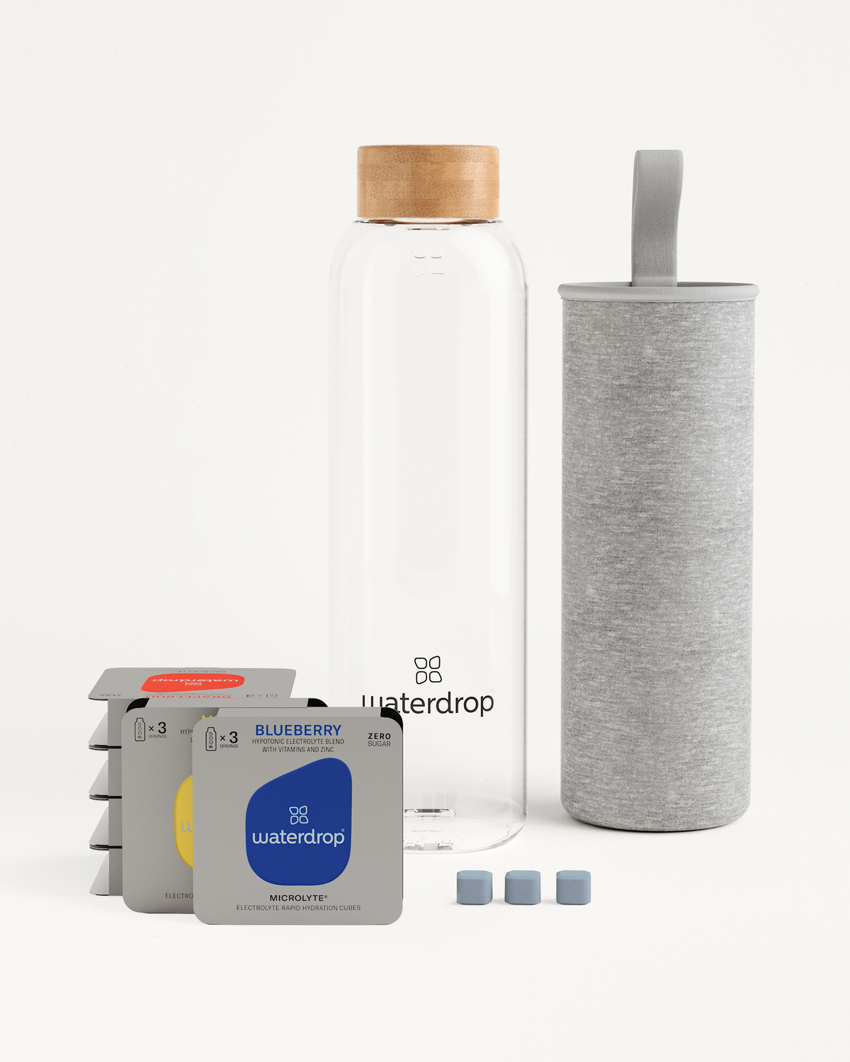 Starter Set Microlyte Glass featuring a water bottle and three electrolyte-packed Microlyte flavors, including a water filter.