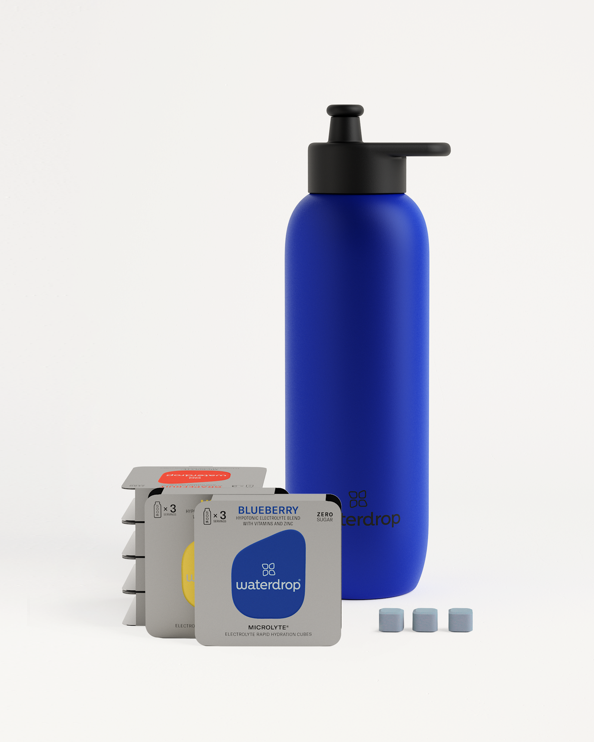 Starter Set Microlyte Ultralight Steel featuring a blue bottle with a black cap, accompanied by several small white boxes containing Microlyte electrolyte packs.