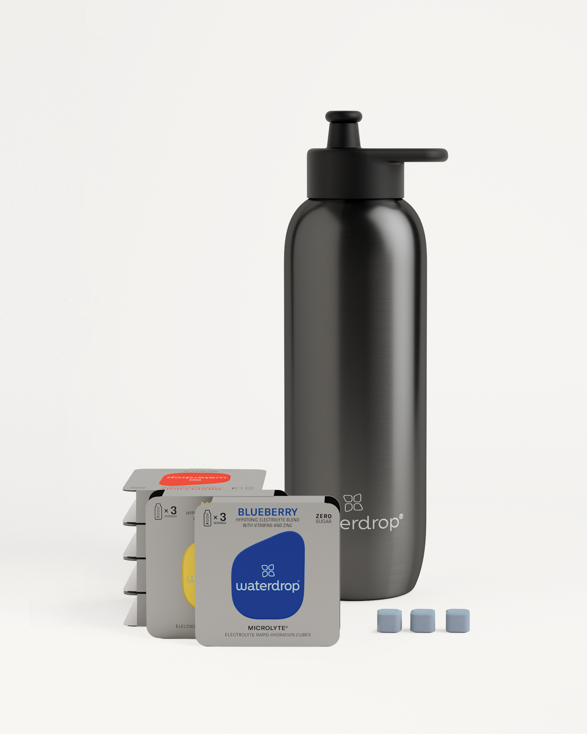 Starter Set Microlyte Ultralight Steel: black pump bottle with three small boxes of electrolyte blends and a black can with a white lid.